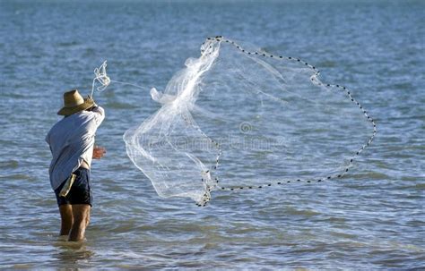 Fisherman Casting a Net, an exquisite study of nature and captivating portrayal of human struggle!